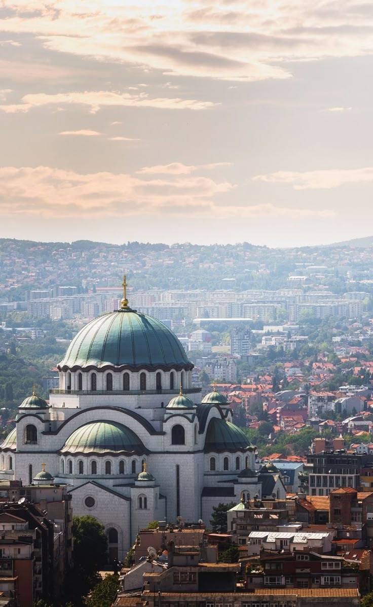The Church of Saint Sava rising over the rooftops of Belgrade